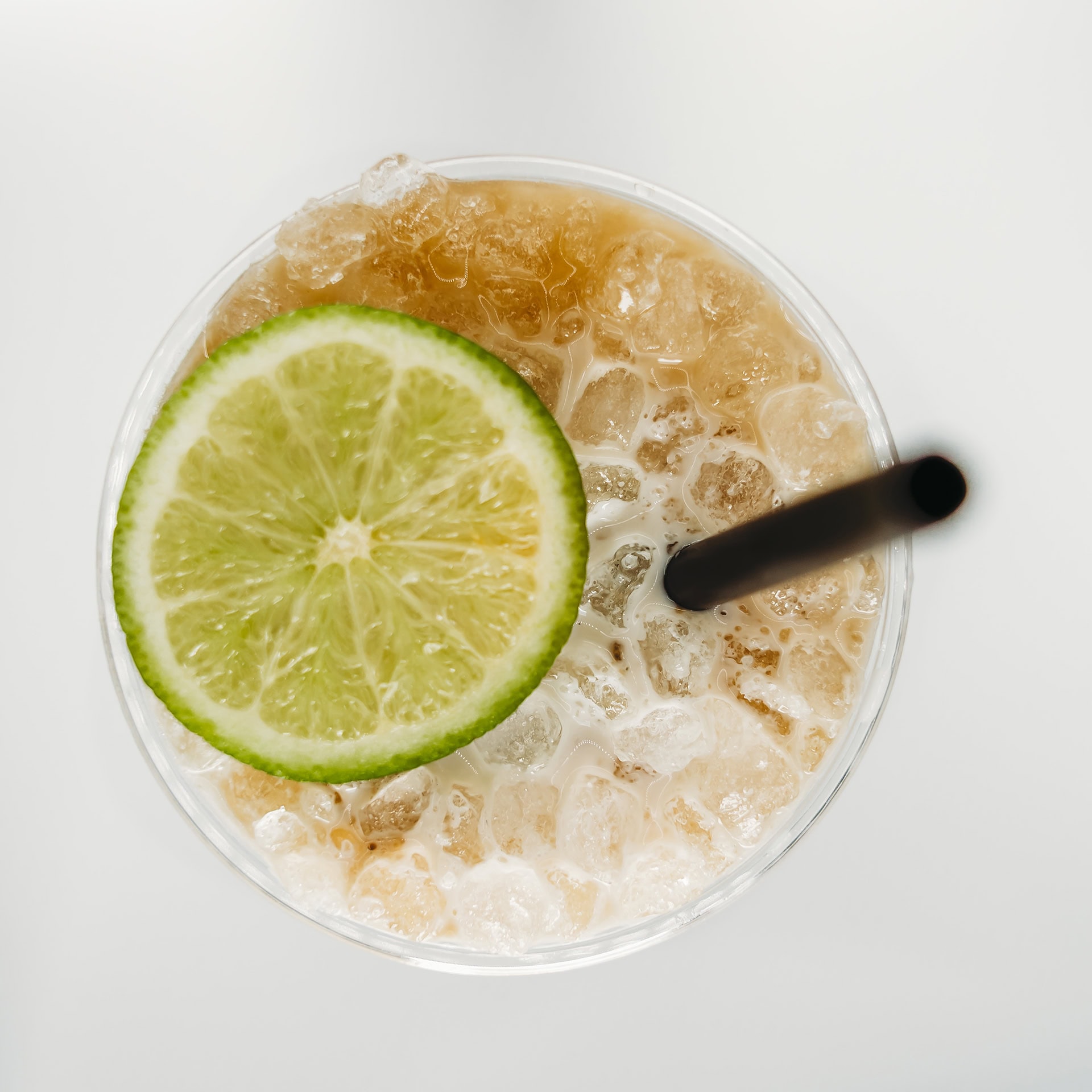 Refreshing lime soda with ice and a black straw from Pop’s Soda Shack.